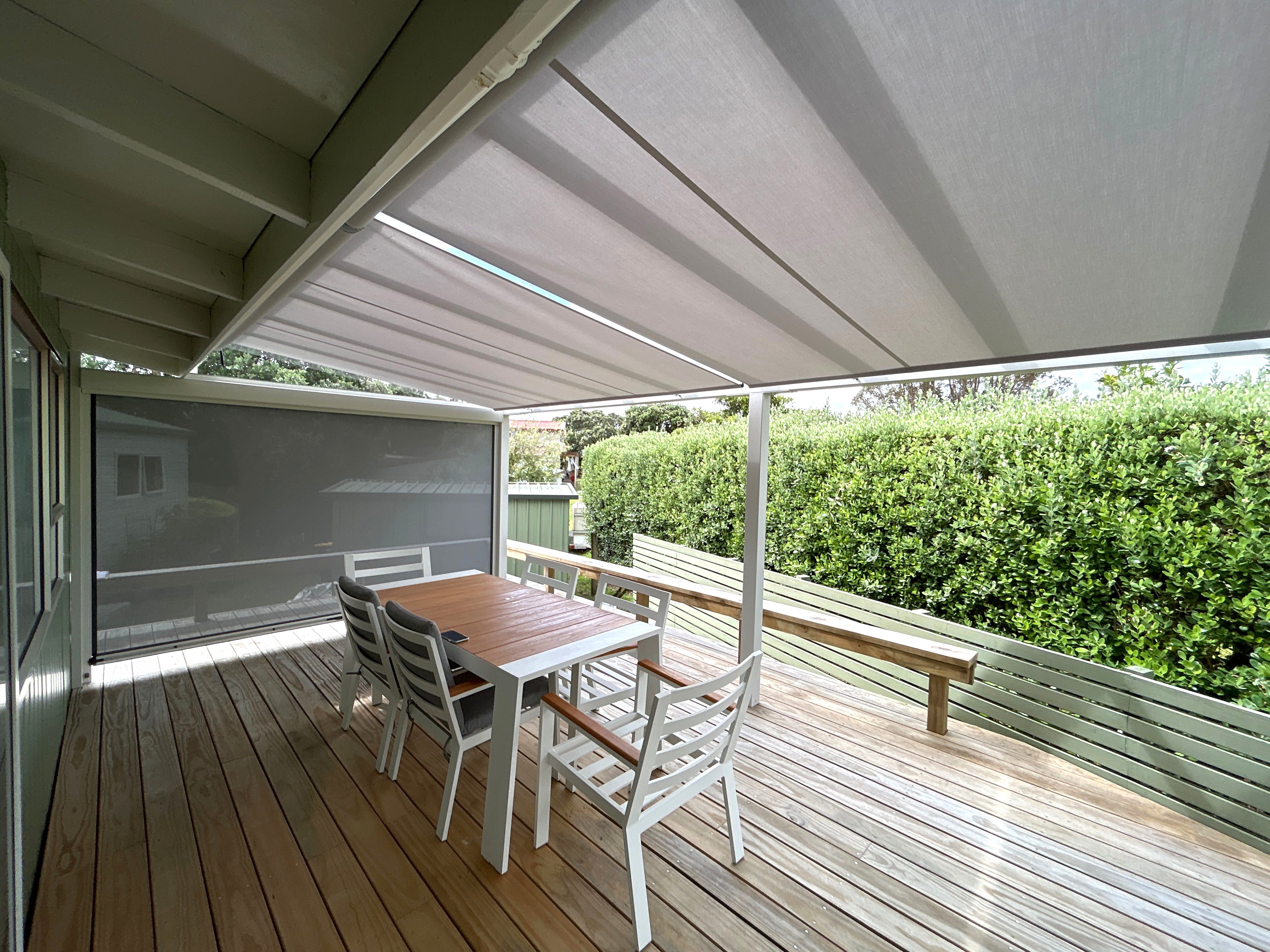 Shadevue awning rolled out over an outdoor area
